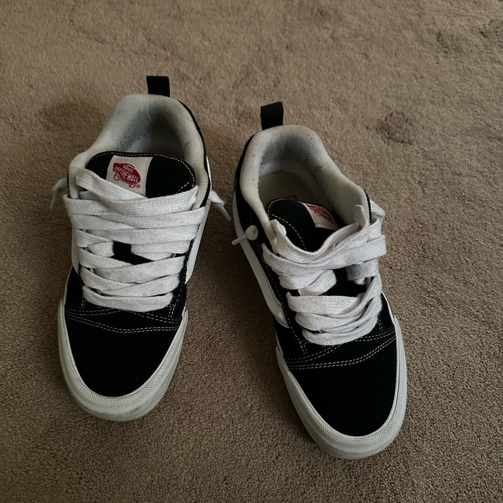 Vans knu school platform sneakers. Black and white size 7men/8.5 women preowned.
